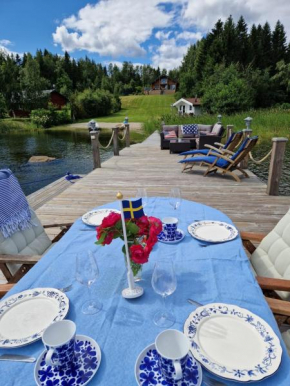 Timber house with private beach and boat including. in Njurunda